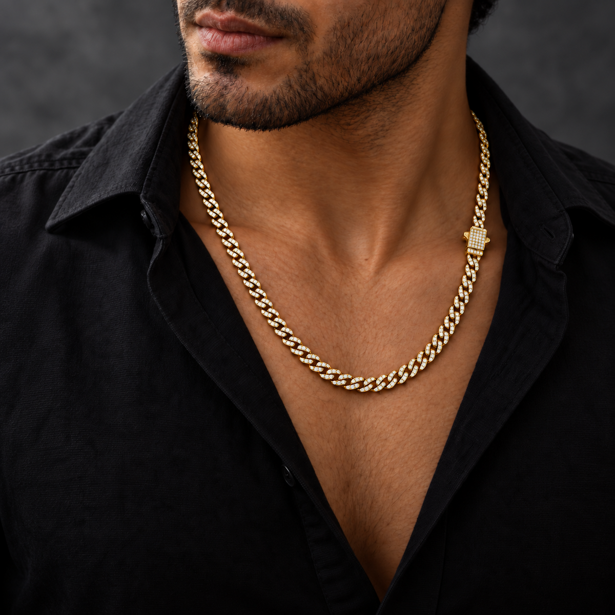 Cadena cubana Gold de 6 mm en acero 316L PVD con circonias 5A para hombre